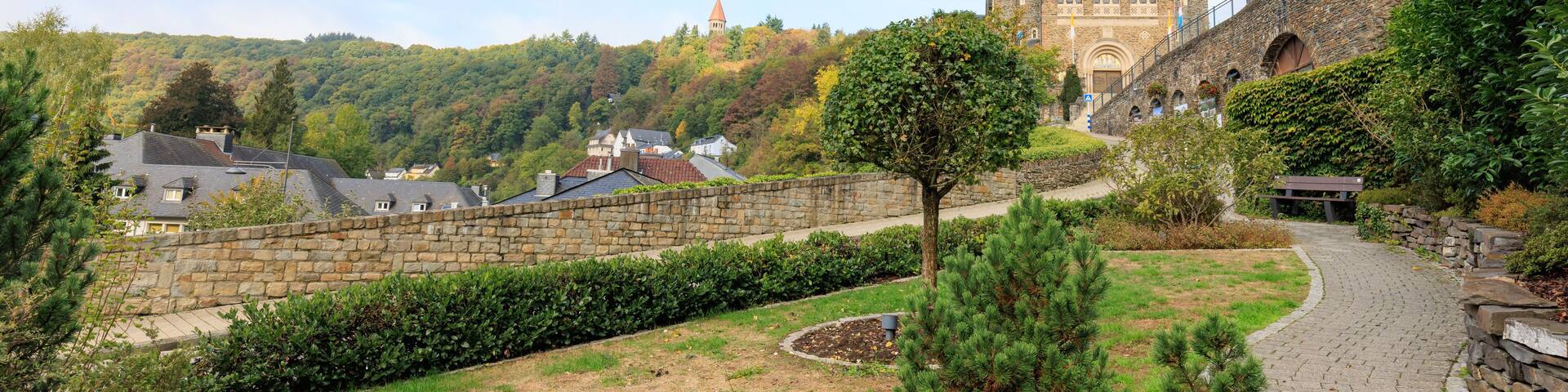 Clervaux, Luxembourg - October 3, 2022: Cityscape with roman catolic church Saints-Come-Et-Damien of Clervaux in Luxembourg