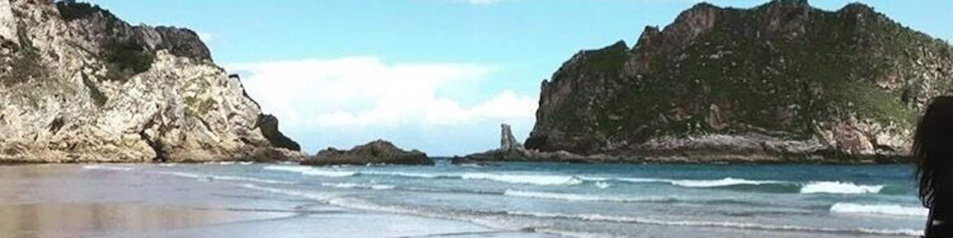 One of the most beautiful beaches in the world đ mostly with low tide. You can go walking on the sand to discover caves and natural pools. Check out for the tide to go high and do not expect hot water đ