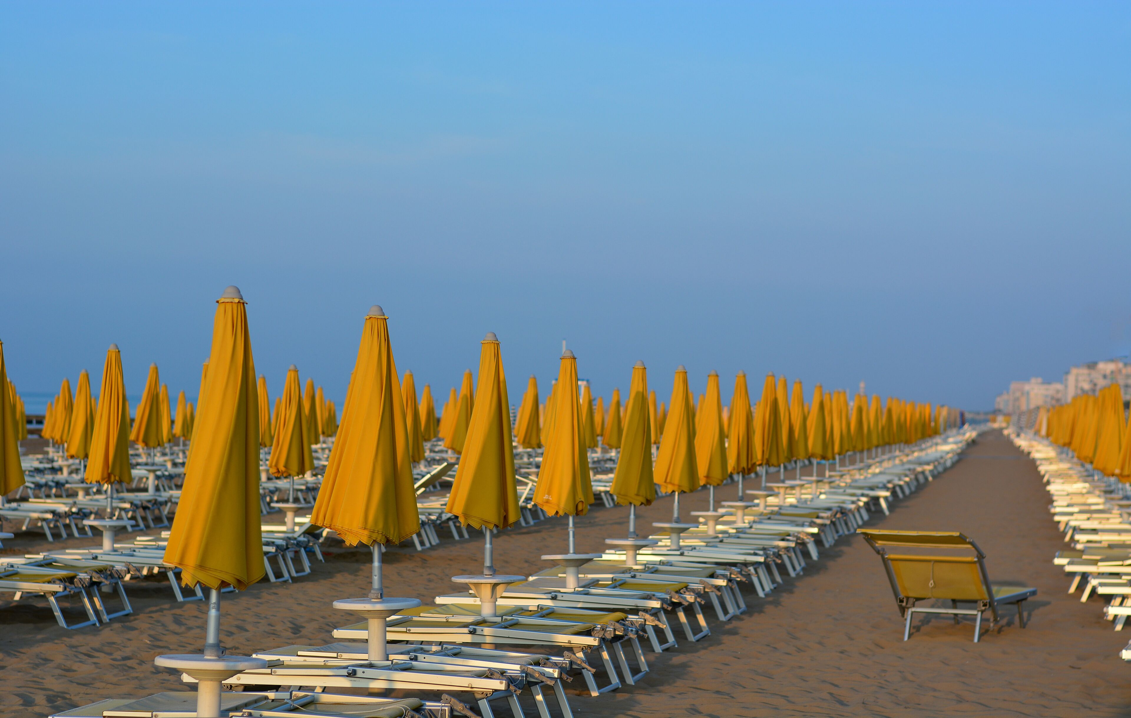 it's dawn on the still deserted beach