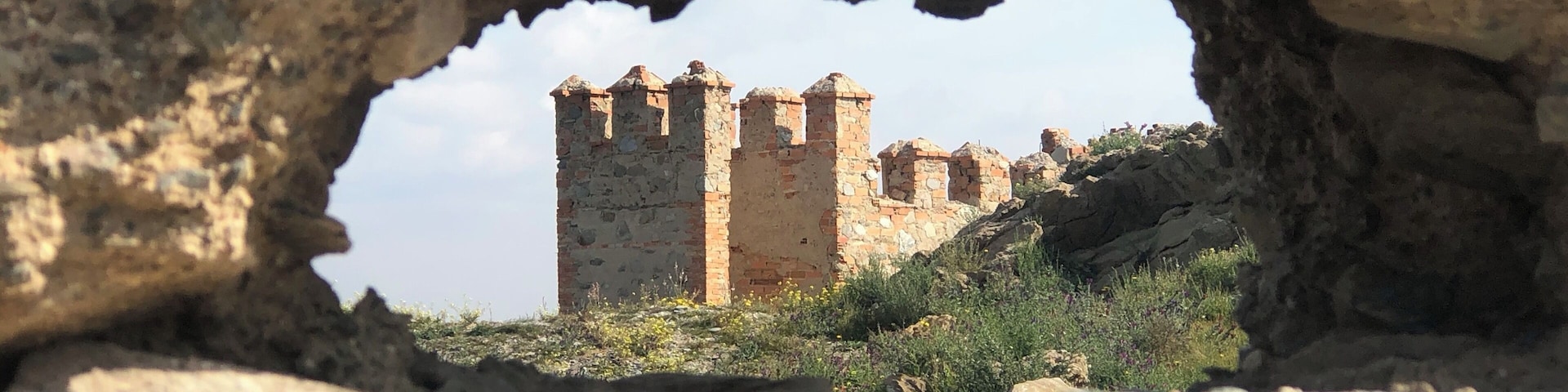 Moor Castle ruins and reconstruction. Best to visit anytime but the summer as this is located in the desert of Almeria. Beautiful flowers in spring (February-March). Good workout climbing uphill on a brick path with parking located nearby.
