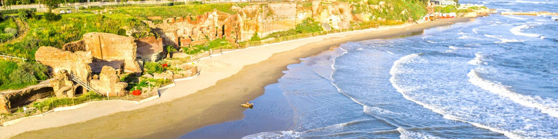 Aerial view of the free beach of the Nerone caves next to the Imperial Villa of Anzio in Italy. Here are the ruins of the emperor's villa of ancient Rome.