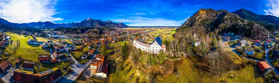 Germany, Marquartstein, Bavaria, Aerial panorama of Marquartstein Castle and surrounding village in summer