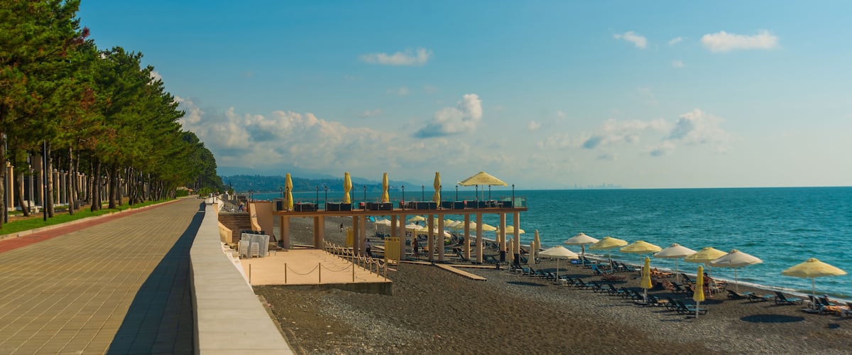 KOBULETI, GEORGIA: Landscape with a view of the promenade by the beach on the Black Sea on a sunny summer day.