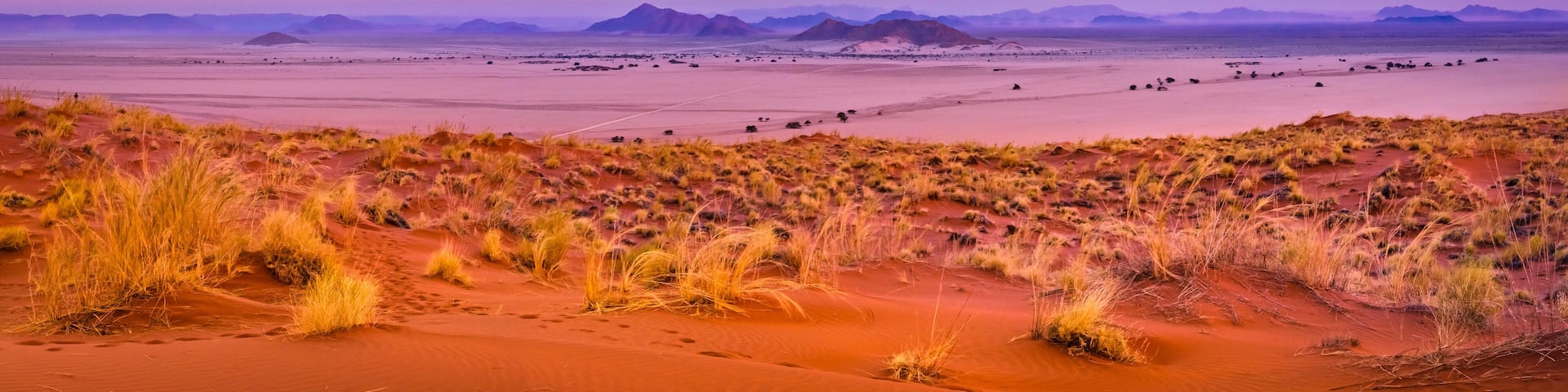 View of Sesriem at sunset from the top of the Elim dune in Namibia.