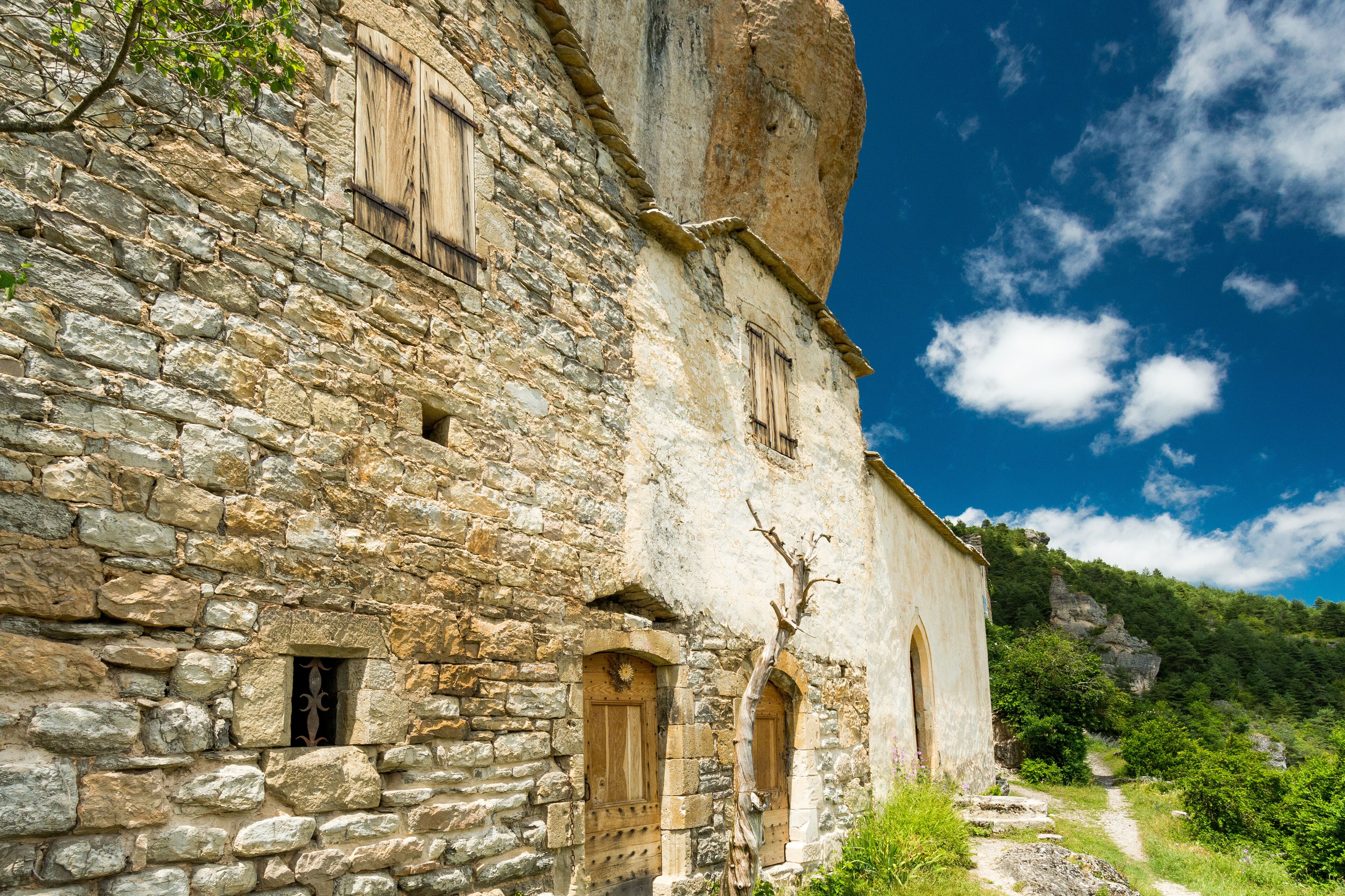 Stone houses of the troglodyte village of Saint Marcellin in the Gorges du Tarn