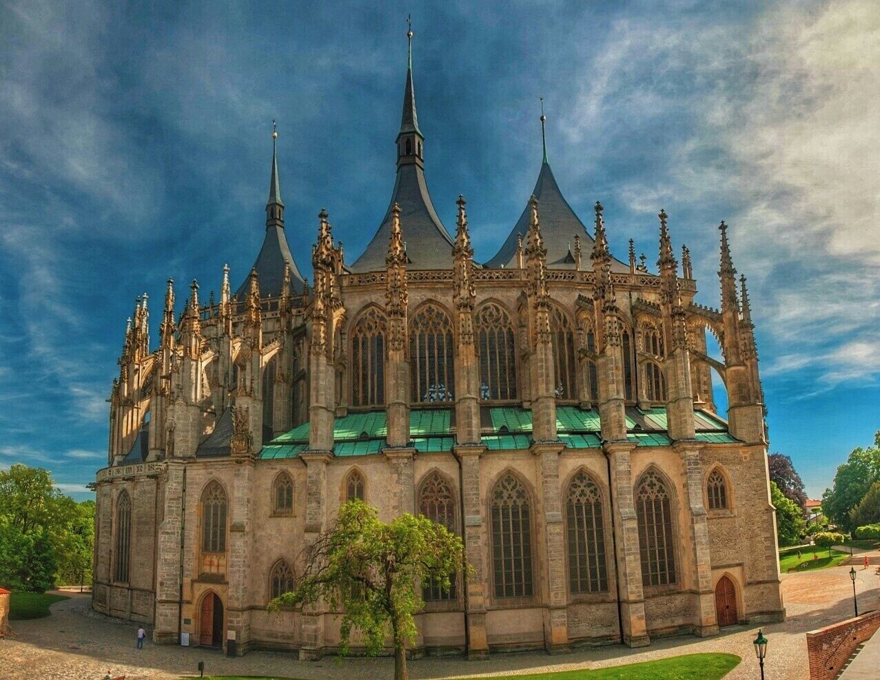 A historic cathedral with multiple spires and intricate Gothic architecture.