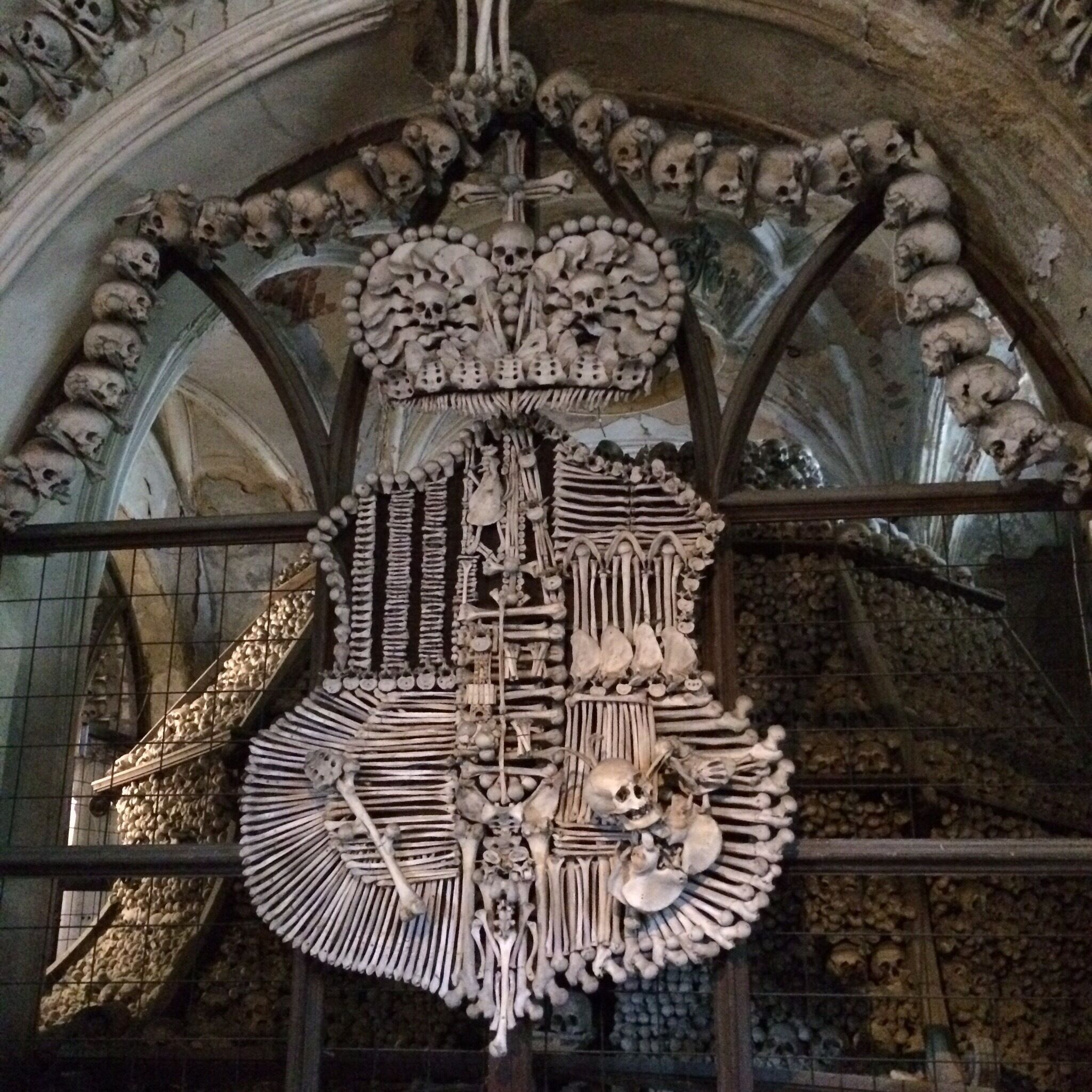 The Sedlec Ossuary is a small Roman Catholic chapel located beneath the Cemetery church. It contains the skeletons of between 40,000 and 70,000 people who died during the Black Death