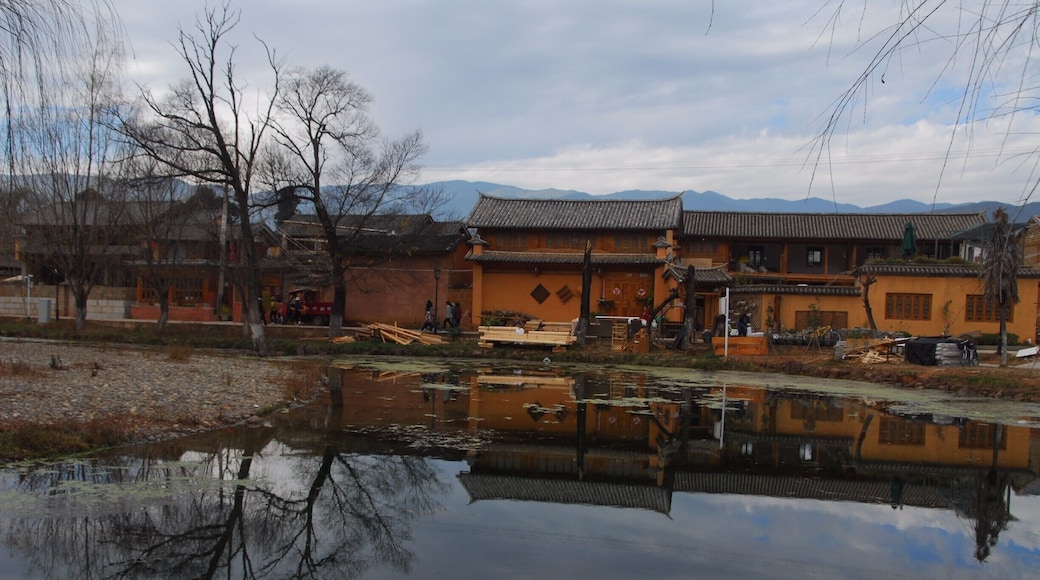 Reflection near Shaxi Old Town Back Gate - and nice park for children young and old to play in while watching peaceful life.