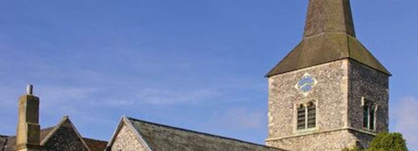 St Nicholas' Church The current building dates mainly from around 1460, replacing a previous building on the site. The vestries (to the left of this photo, which views the church from the north east) were added in 1849 and 1896. The steeple was extended to its present height after the original was destroyed in a fire in 1857. The building is grade II* listed - for listing particulars see http://www.heritagegateway.org.uk/Gateway/Results_Single.aspx?uid=358409&resourceID=5.