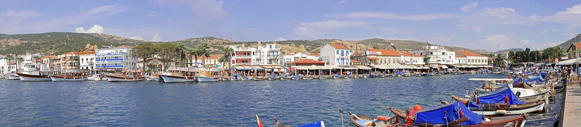 ESKI FOCA, IZMIR, TURKEY - JUNE 08, 2014: Eski Foca city center bay documentary panorama