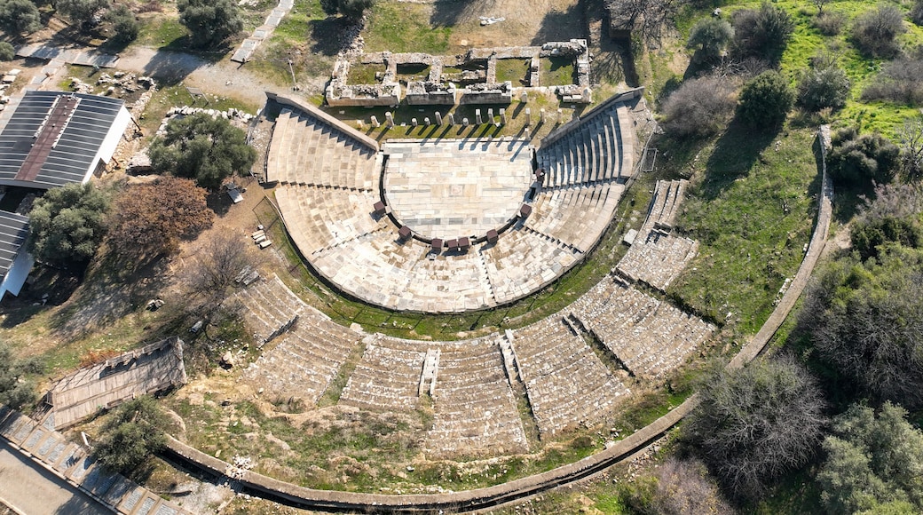 Torbali, Izmir, Turkey: View of the reconstructed theater in the ancient site of Metropolis in Izmir, Turkey, with the village of Yeniköy in the background.