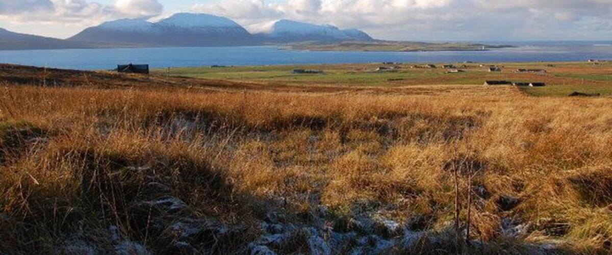 Hoy from Scorradale Looking over moorland with Culdigo on the left. Clestrain Sound, then the island of Graemsay with one of the two lighthouses there. Hoy hills beyond, with Ward Hill, the highest point in Orkney at 479m beyond. There are 9 or 10 Ward Hills in Orkney.