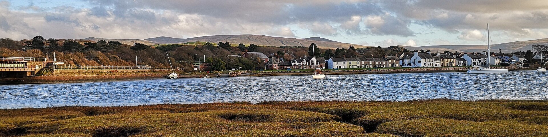 Perfect coastal village in Cumbria. A short walk to Muncaster Castle. The kind of beach perfect for beach combing and wildlife spotting. A couple of warm welcoming pubs and of course The Ratty railway . :)