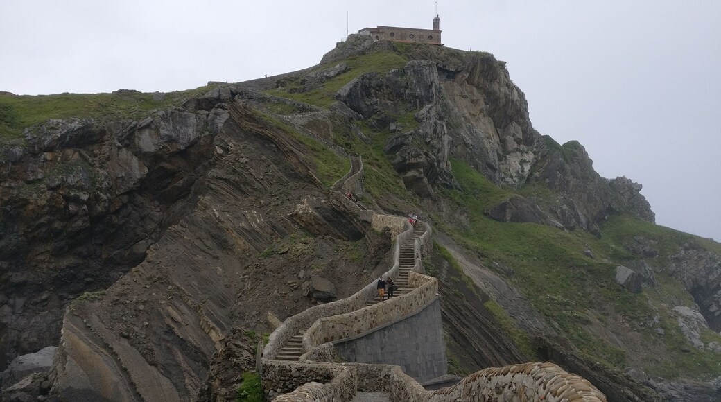 Hidden on the northern Spanish coast in Basque Country lies this small island connected to the mainland by a man-made bridge. At the top of Gaztelugatxe sits a small church that dates back to the 10th century and is apparently dedicated to John the Baptist. This hidden gem and the small hike with the cool ocean air are totally worth the long and windy drive to get there. Additionally, this small island was used as a filming location for the Game of Thrones.
#LifeAtExpedia
#myadventuresinSpain
#Spain