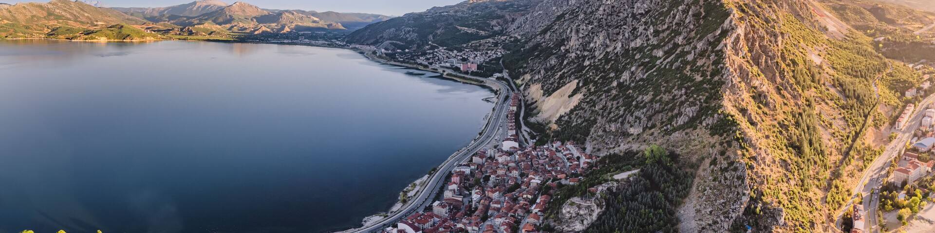 Aerial scenic view of Egirdir lake peninsula and town in Isparta region. Calm turquoise and scenic coast of national park in Turkey