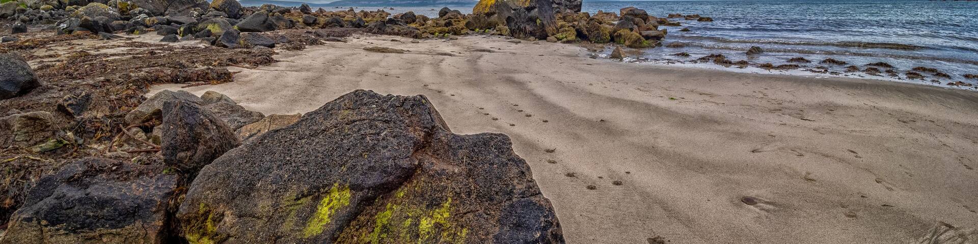 Na Forbacha Beach - Rocky Beach With Water and Cloudy Sky