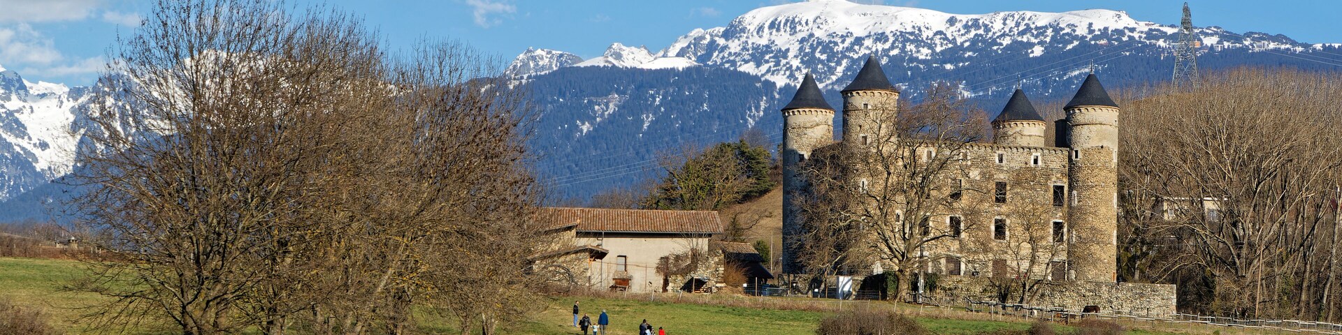 JARRIE, FRANCE, February 27, 2022 : Castle of Bon Repos is a former strong house of XV century. Here with Chamrousse summit in the background