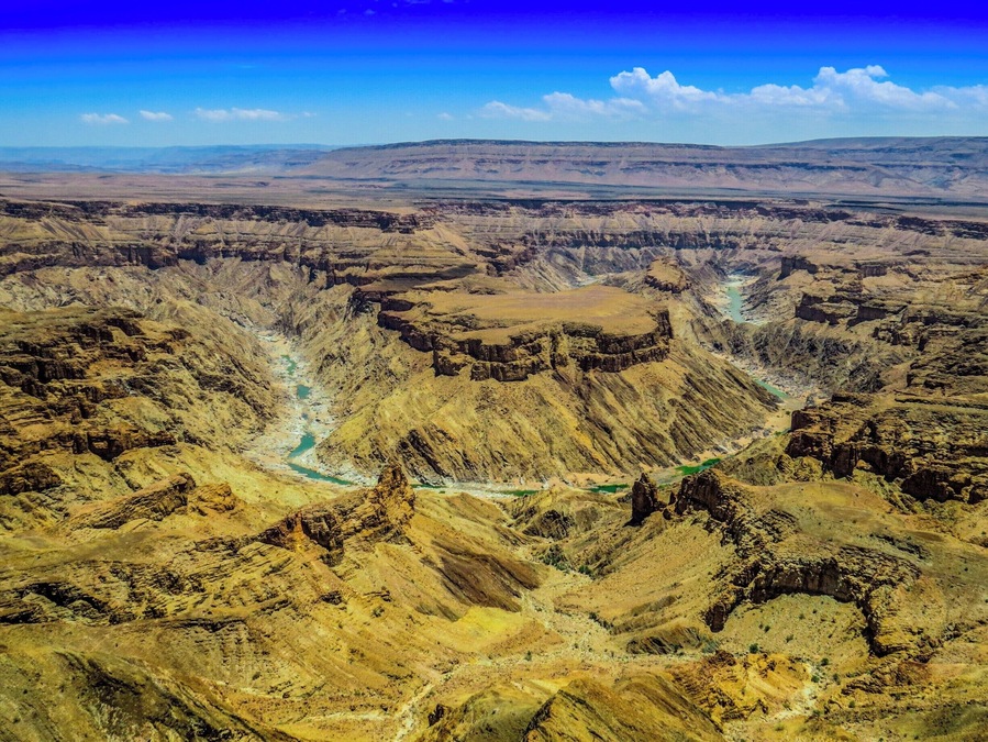 Fish River Canyon in Namibia, the largest canyon in Africa. I could spend the whole day seated on the edge and gazing this beauty of the nature.