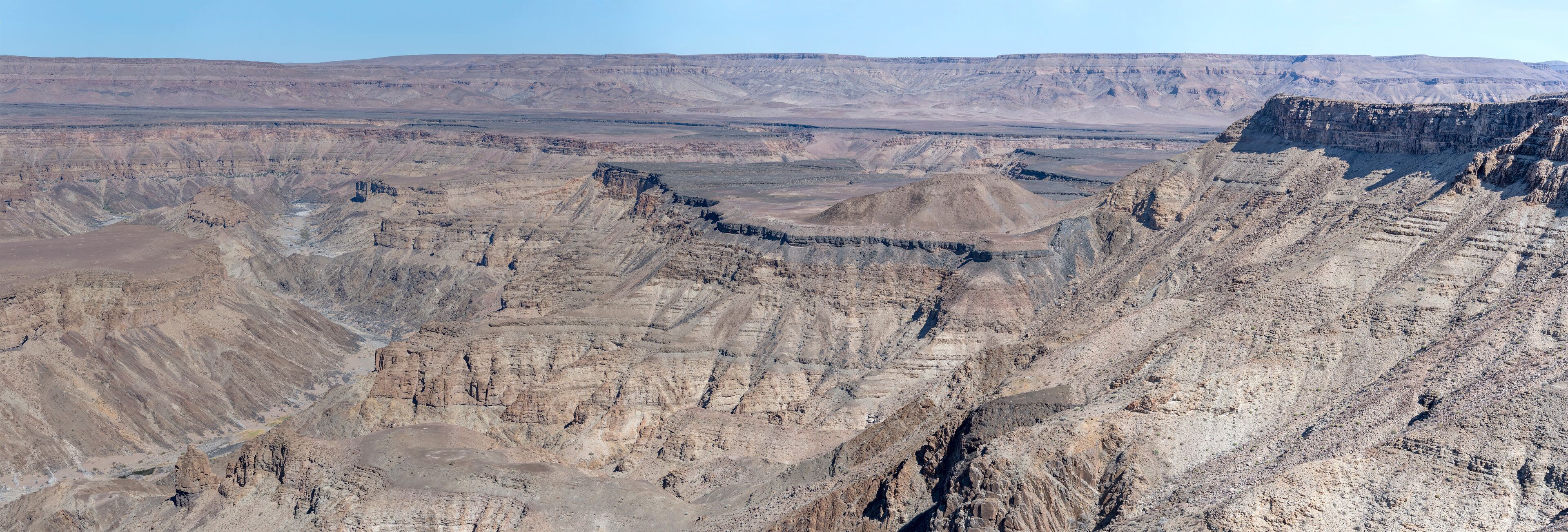 escarpment worn slopes and meandering dry riverbed looking north from Canyon viewpoint, Fish River Canyon,  Namibia
