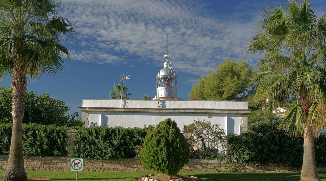 Red light lighthouse, located in one of the extremes of the Los Alfaques bay, in Ebro Delta. San Carlos de la Rápita, Tarragona, Spain