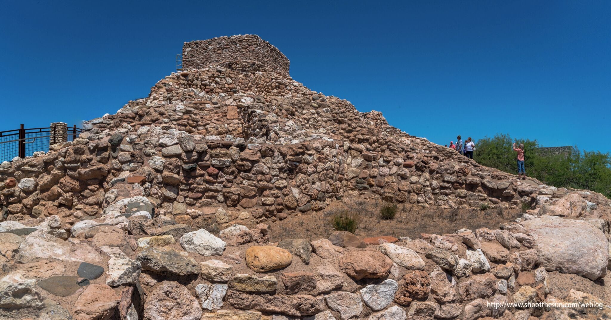 No doubt as fascinating for us today as it was for the people who first lived here, the structure at Tuzigoot almost defies credibility.  It sits in the middle of what you could arguably call "nowhere" and stretches for acres in all directions.

This turret on top is its crowning glory.  Archeologists theorize that the chamber inside was probably used for religious services and community gatherings, though there is hardly any evidence to support it.  It's not difficult to expand on that and posit that it must also have been used as a place from which to survey the valley, whether to check on the progress of the current crop or to keep an eye out for invaders.  Let me say that this latter hypothesis is strictly my own, though it can hardly be original.

As I mentioned before, this is probably one of the most important historical sites of pre-Columbian North America.  The Sinaguans are a mysterious people, who came and went with hardly a trace -- though several modern tribes claim them as their ancestors.  

What they built in that short time is a marvel (if not a miracle), and anyone who lives here should avail themselves of the opportunity to see what was accomplished in the harsh and unforgiving desert so many centuries ago.