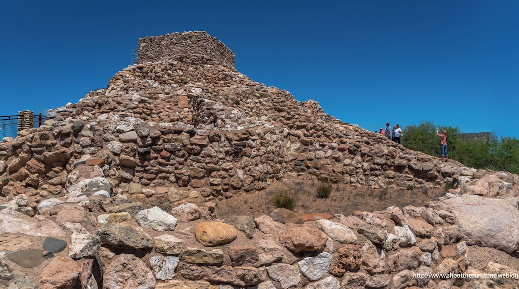 No doubt as fascinating for us today as it was for the people who first lived here, the structure at Tuzigoot almost defies credibility. It sits in the middle of what you could arguably call "nowhere" and stretches for acres in all directions.
This turret on top is its crowning glory. Archeologists theorize that the chamber inside was probably used for religious services and community gatherings, though there is hardly any evidence to support it. It's not difficult to expand on that and posit that it must also have been used as a place from which to survey the valley, whether to check on the progress of the current crop or to keep an eye out for invaders. Let me say that this latter hypothesis is strictly my own, though it can hardly be original.
As I mentioned before, this is probably one of the most important historical sites of pre-Columbian North America. The Sinaguans are a mysterious people, who came and went with hardly a trace -- though several modern tribes claim them as their ancestors.
What they built in that short time is a marvel (if not a miracle), and anyone who lives here should avail themselves of the opportunity to see what was accomplished in the harsh and unforgiving desert so many centuries ago.