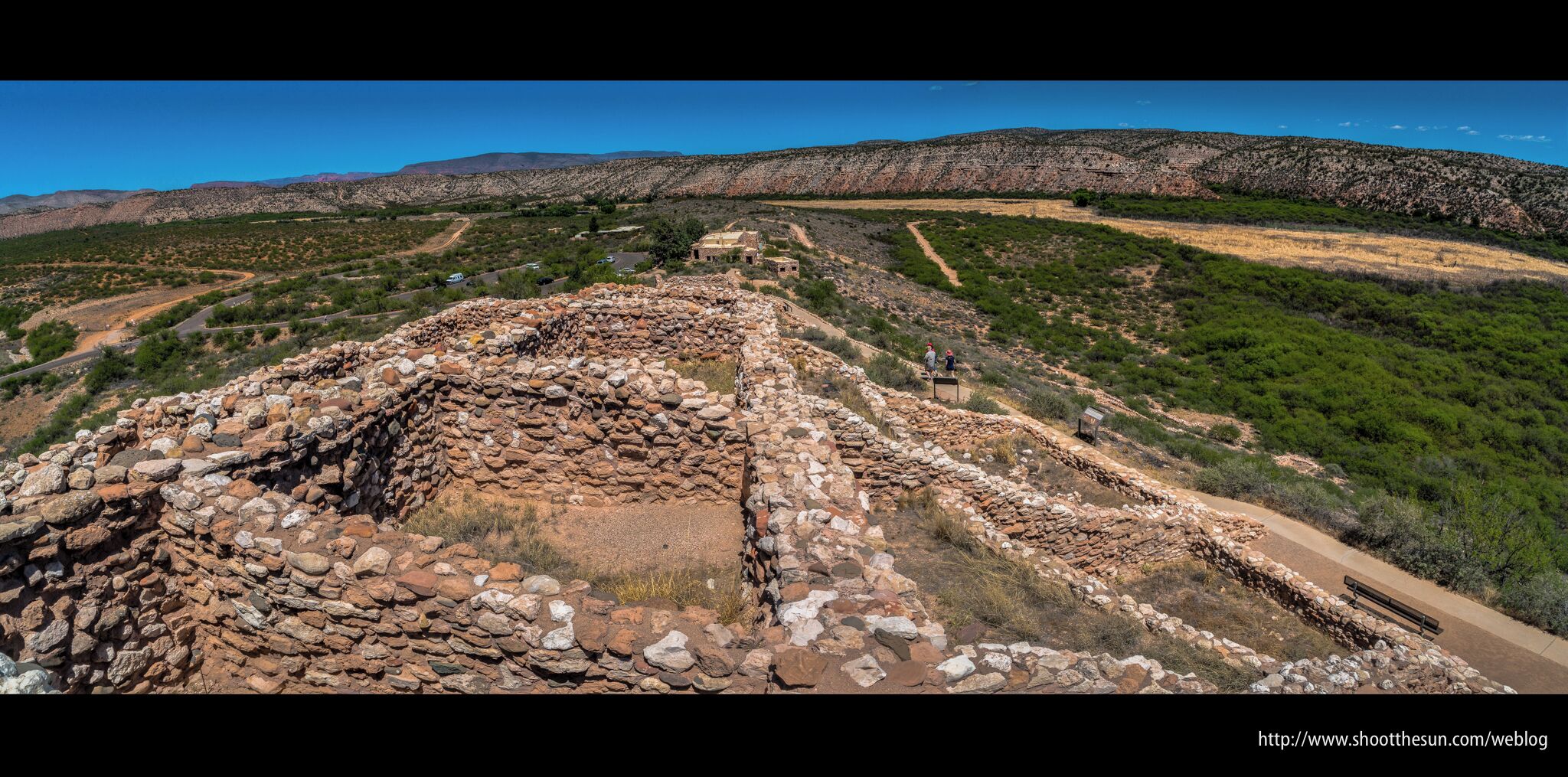 I posted an image from the base of the monument which shows a large "turret" structure situated at the top.  This image was taken from that structure, looking back across the opposite side of the monument, towards the visitors center and the hills of the Verde River Valley in the background.