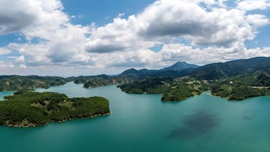Plastiras Lake, Greece panoramic aerial view, blue cloudy sky. Artificial lake in Karditsa, Thessaly