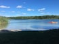 Beautifully clear and warm lake. Went here with my dog and saw several kayakers. Not a huge lake but very pretty. Short walking trails too.