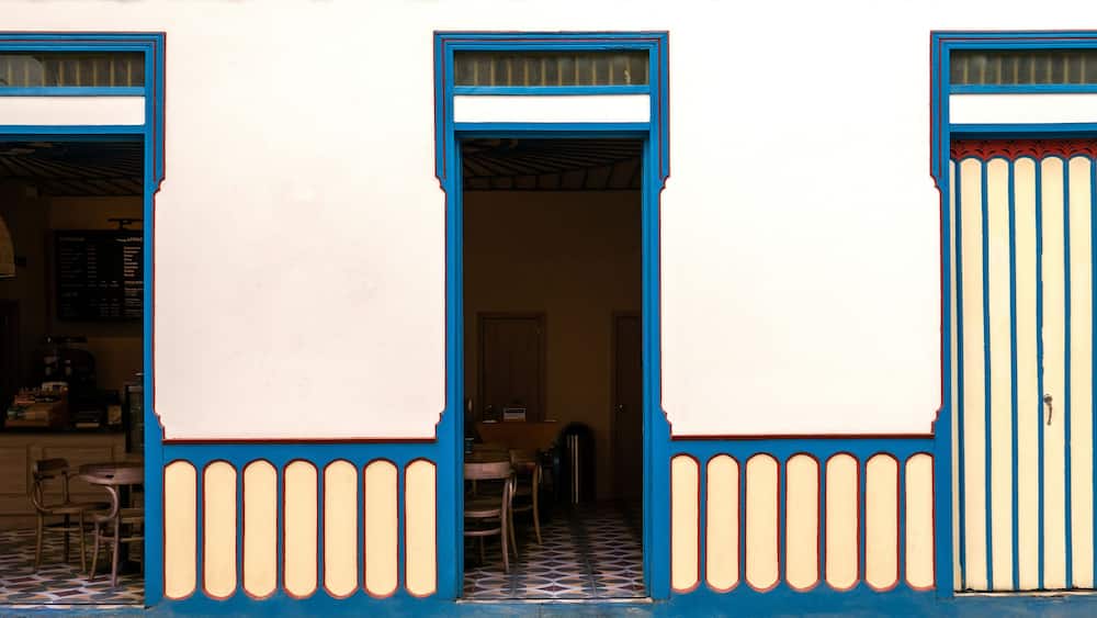 Three doors of a cafe in Filandia, Quindío, Colombia