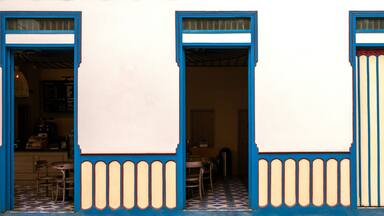 Three doors of a cafe in Filandia, Quindío, Colombia