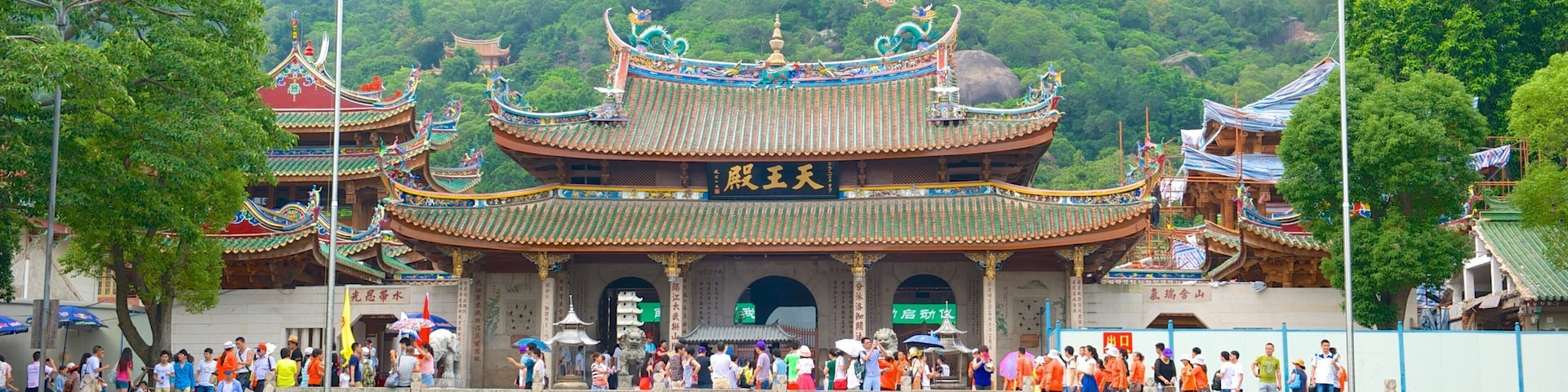 Templo de Nanputuo ofreciendo escenas cotidianas, aspectos religiosos y un templo o lugar de culto
