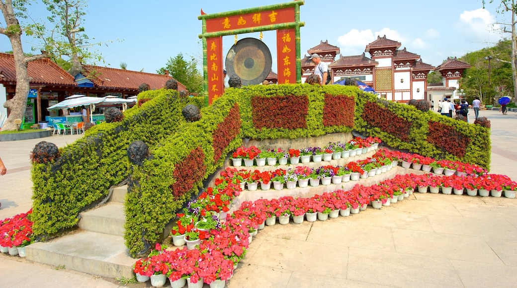 Guanyin Statue of Hainan featuring flowers, a monument and a square or plaza