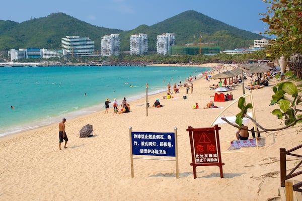 Dadongdai Beach featuring a coastal town, a beach and signage