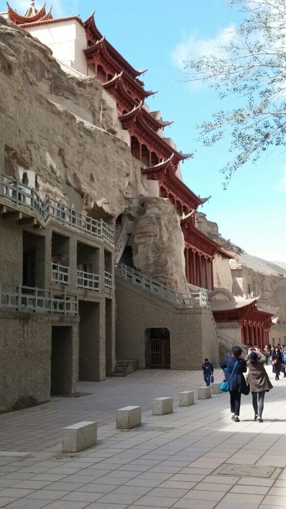 Mogao caves Buddhist statuary and frescos inside the caves
