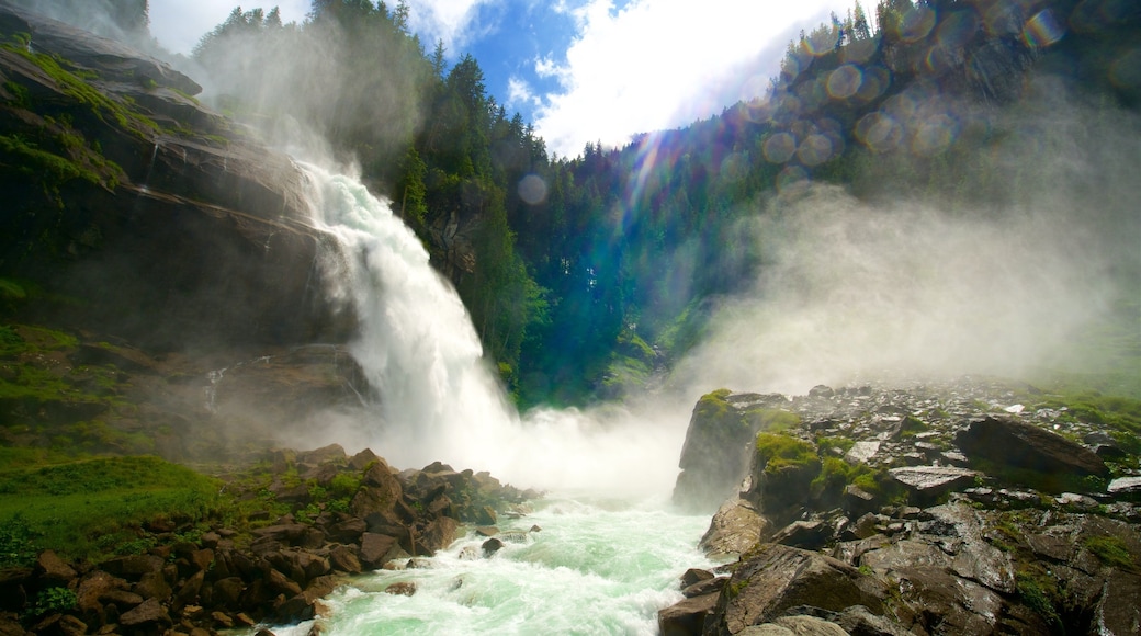 Krimmler Waterfalls which includes a cascade, forests and a river or creek