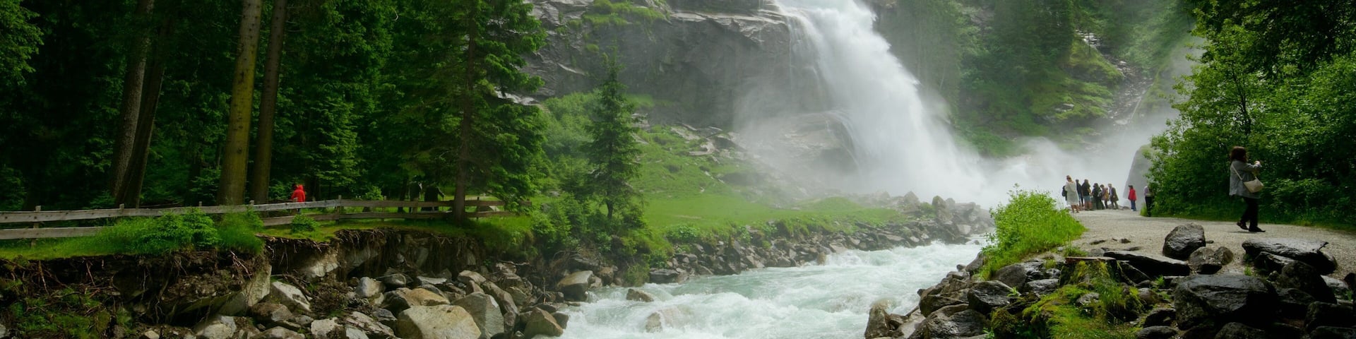 Krimmler Waterfalls which includes a cascade, forests and a river or creek