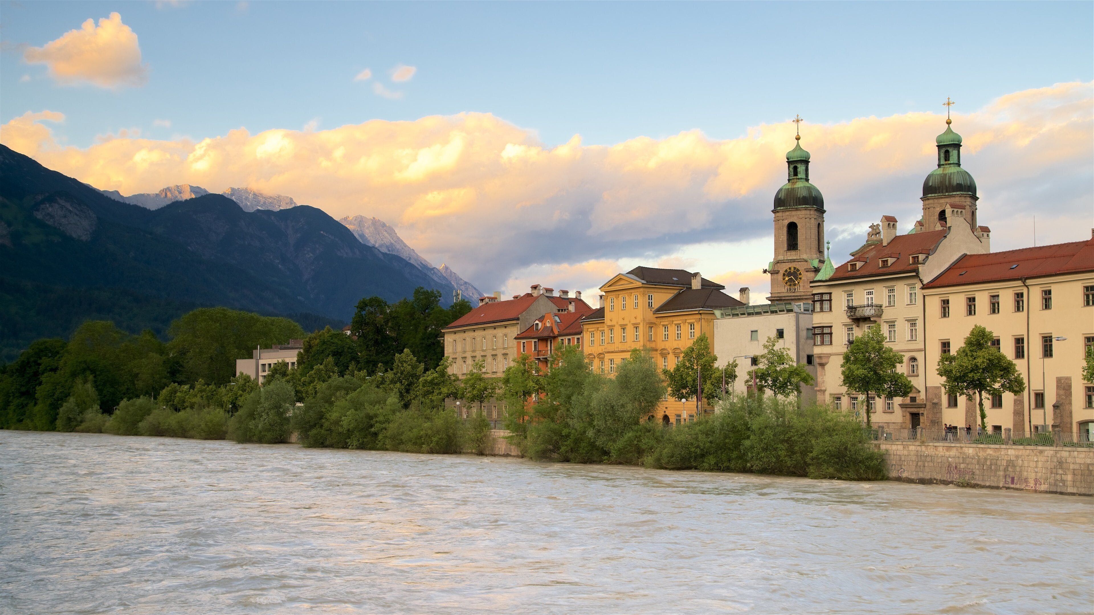 Cathedral of St. James showing a sunset, heritage elements and a lake or waterhole