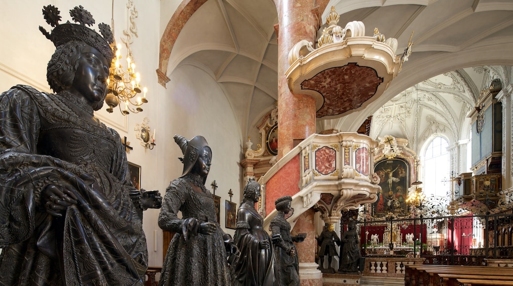 Court Church featuring a church or cathedral, a statue or sculpture and interior views