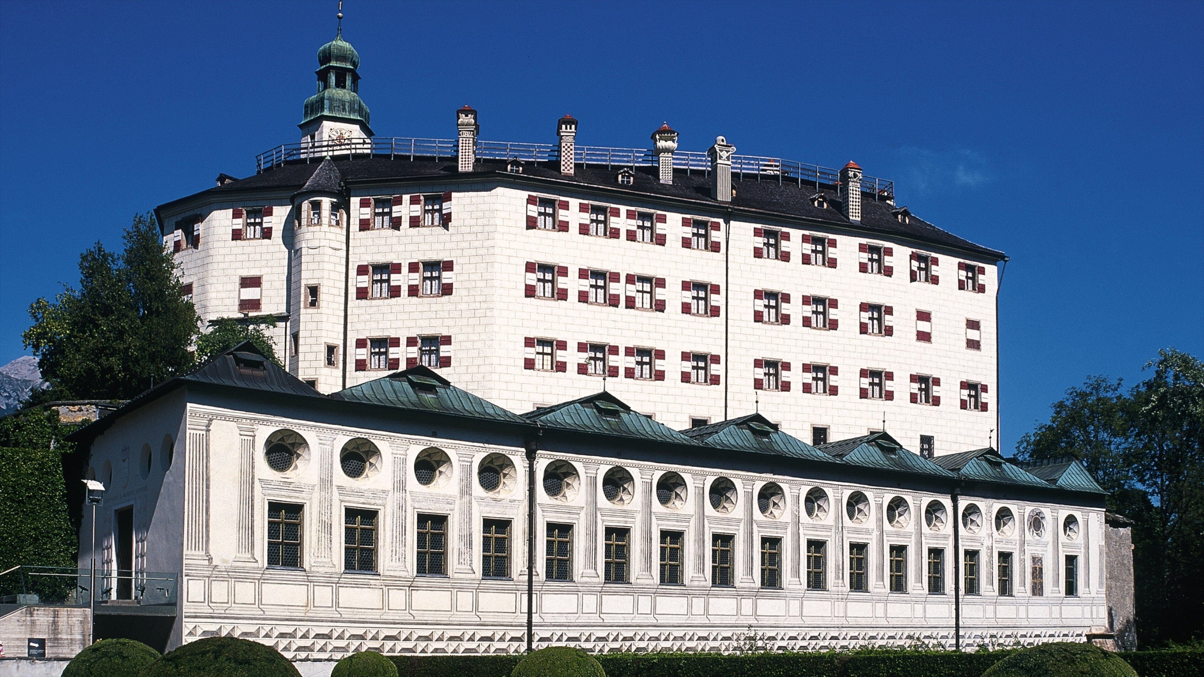 Ambras Castle featuring chateau or palace and heritage architecture