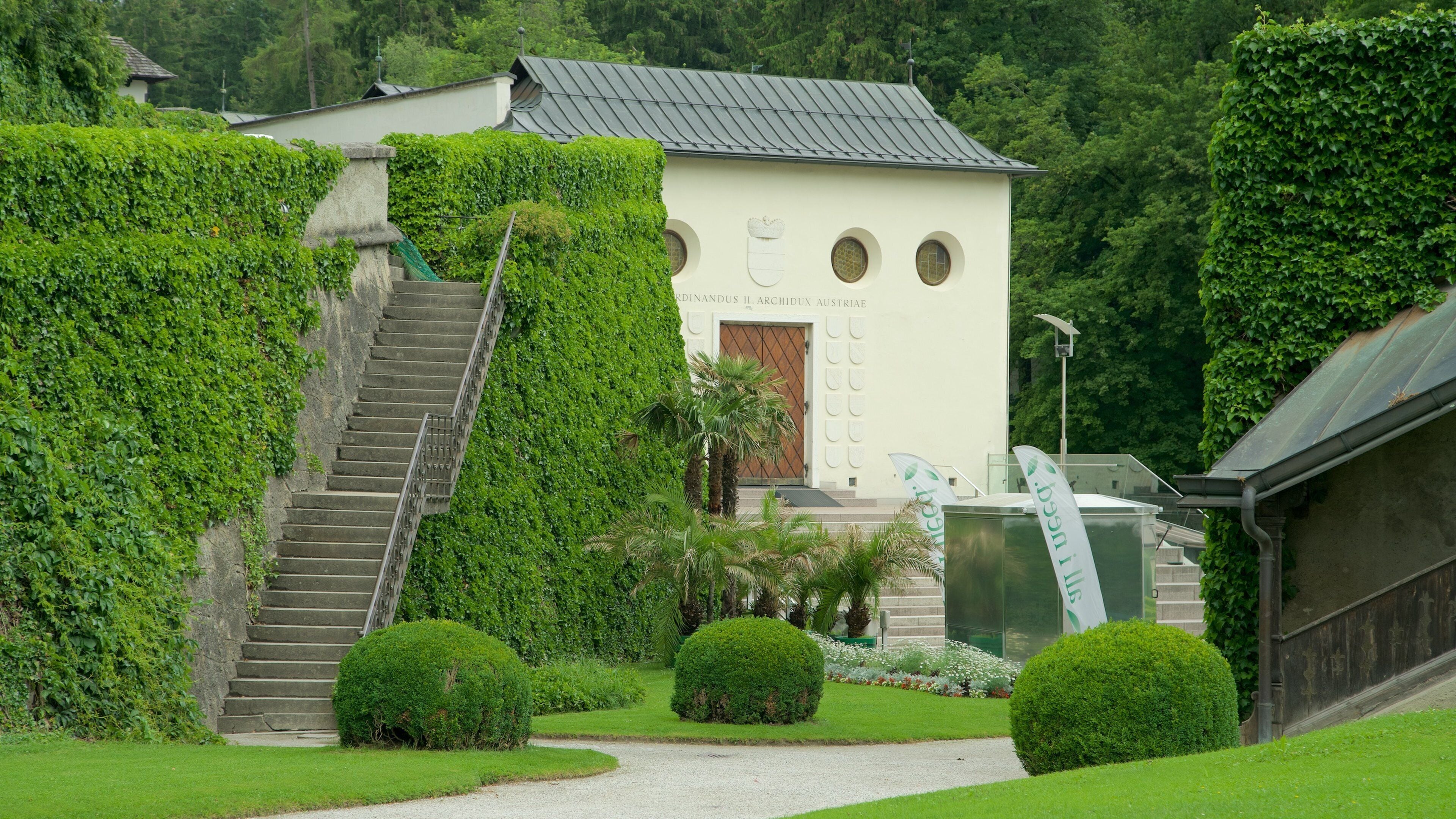 Ambras Castle which includes a garden and heritage elements