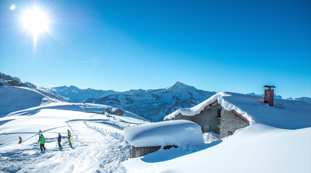 Damuels-Mellau-Fashina Ski Resort featuring snow, mountains and a house