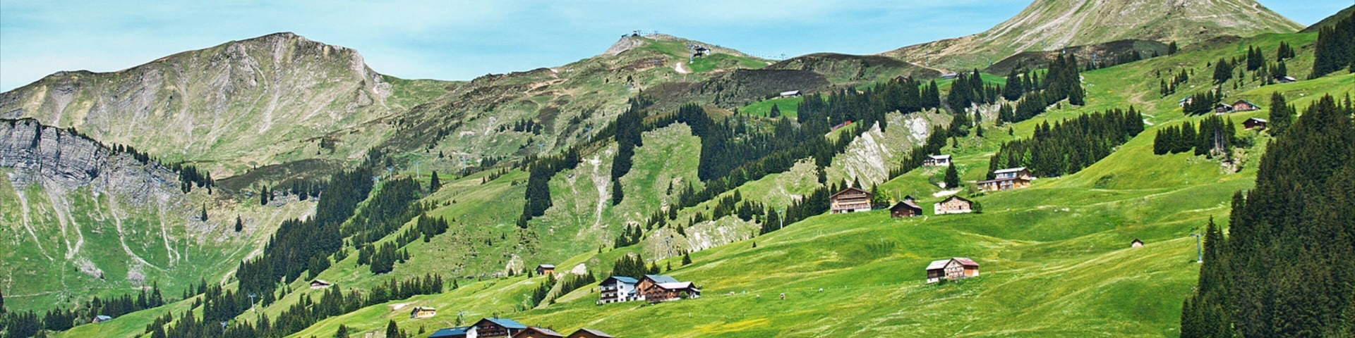 Damuels-Mellau-Fashina Ski Resort which includes farmland, mountains and a small town or village