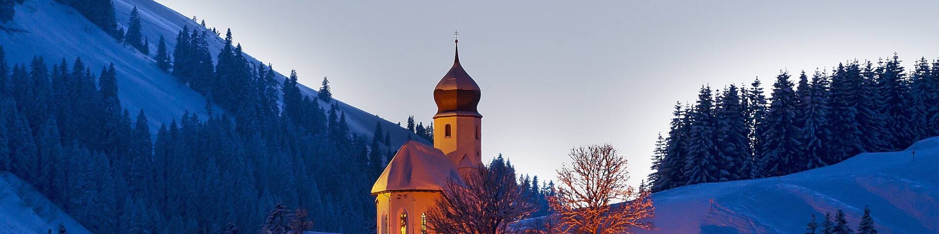 Damuels-Mellau-Fashina Ski Resort featuring snow, a luxury hotel or resort and mountains