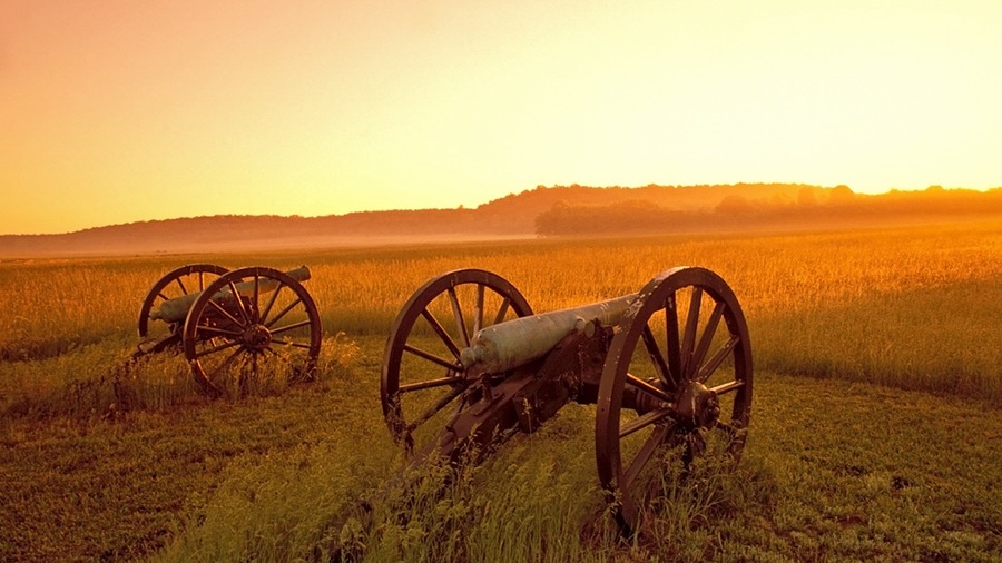 Pea Ridge National Military Park which includes a sunset, tranquil scenes and military items