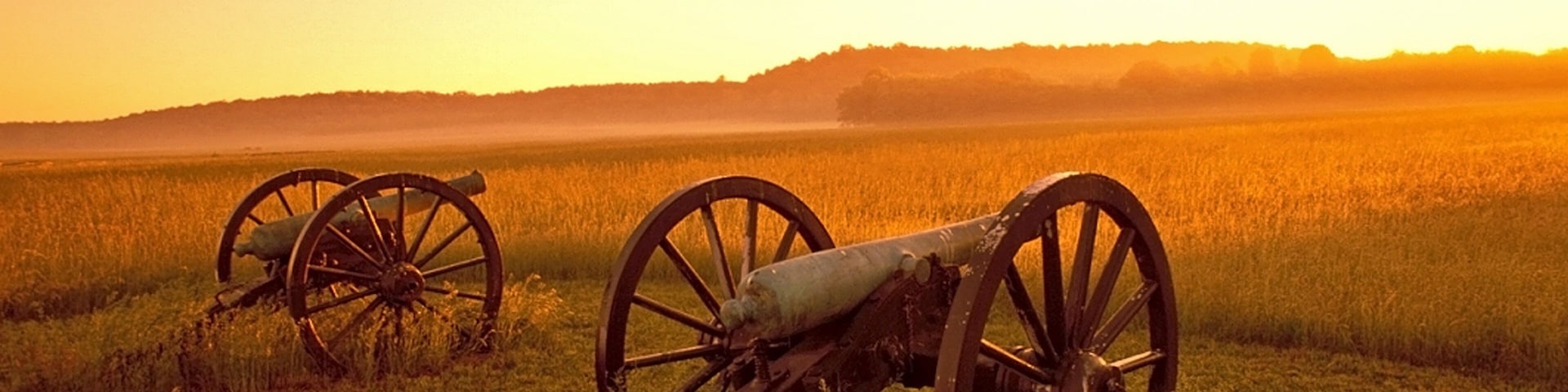 Pea Ridge National Military Park which includes a sunset, tranquil scenes and military items