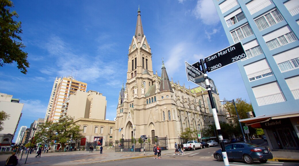 Mar del Plata Cathedral showing a city, a church or cathedral and signage