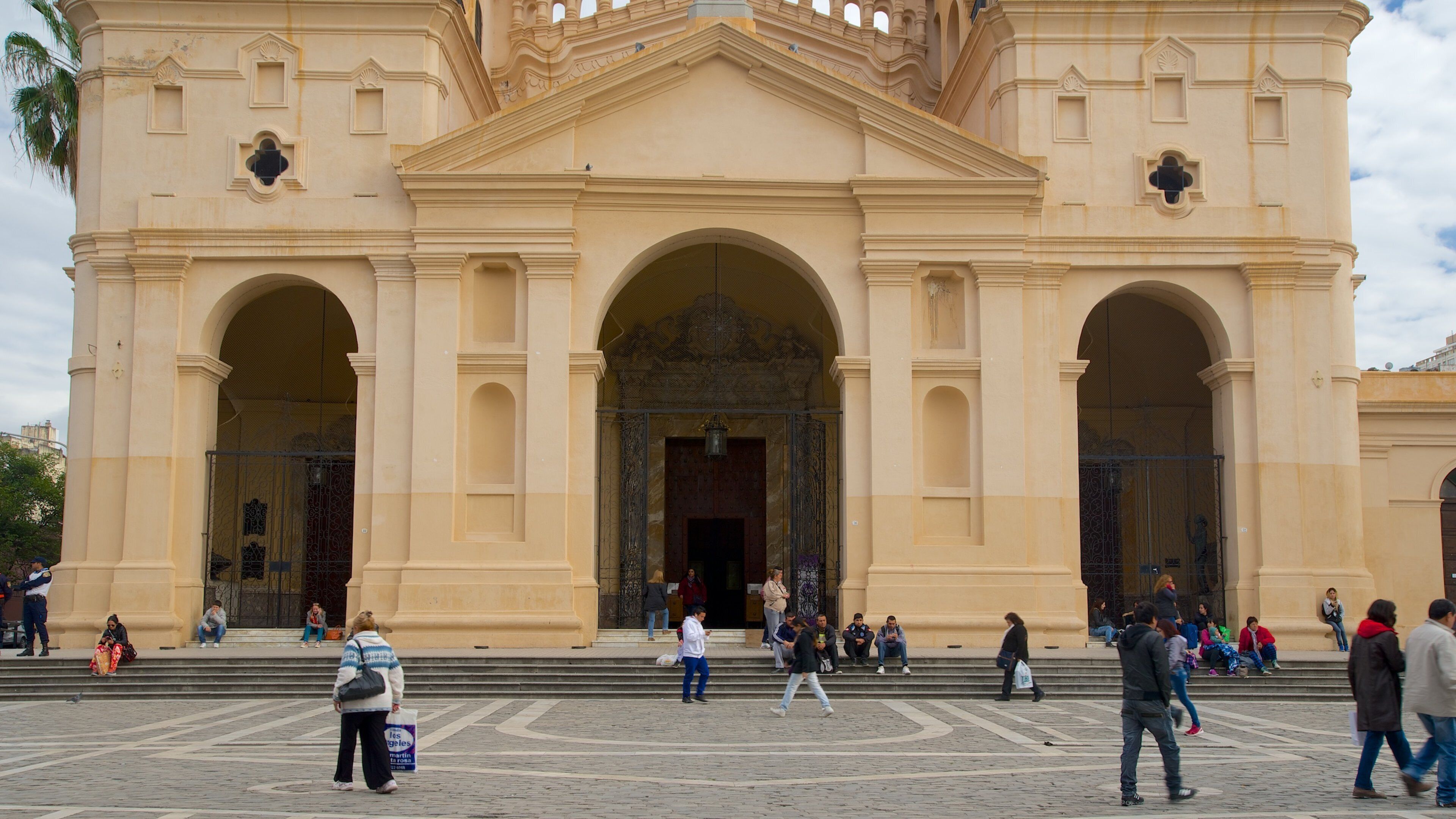 Cordoba Cathedral which includes a square or plaza, a church or cathedral and religious elements