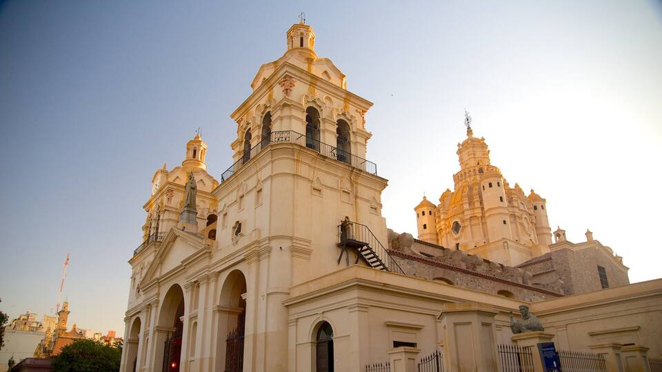 A large, ornate church with multiple towers and statues.