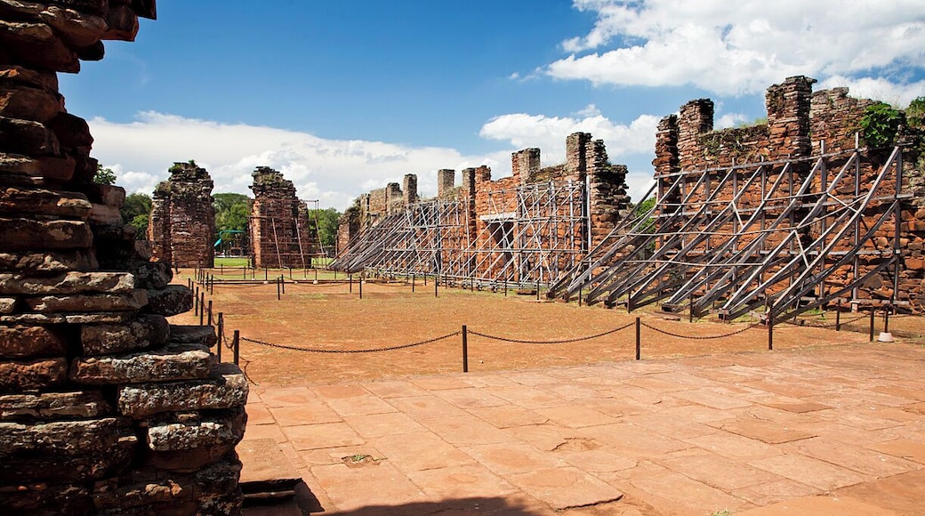 The red sandstone remains of the church at this 350 year old Jesuit mission are impressive. It once stood 30ft tall (10m) and covered an area 240ft long and 79ft wide (74m x 24m). Although none of the woodwork remains, some of the original floor tiles are still in place.
San Ignacio Mini was a Jesuit mission established in 1610 with the aim of converting the local Guaraní natives. The mission moved to this location in 1666 and a large complex was erected to house and protect up to 4000 converts. The complex was built in Spanish baroque style around a central courtyard and included a large church, school, hospital, cemetery, dormitories and workshops.
The mission was largely abandoned when the Jesuits were expelled by Spanish decree in 1767, and was then destroyed by Paraguayan decree some 50 years later. The remains of the mission were rediscovered in 1897 and are now listed as a UNESCO World Heritage Site.